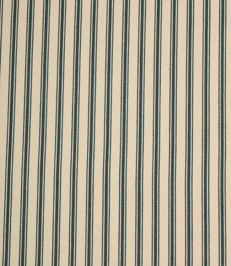 Classic indigo ticking stripe fabric with narrow blue stripes on a warm ivory background, featuring a subtle herringbone weave for a timeless country style.