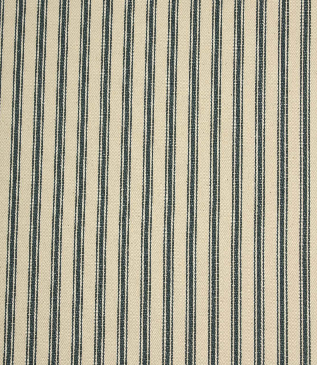 Classic indigo ticking stripe fabric with narrow blue stripes on a warm ivory background, featuring a subtle herringbone weave for a timeless country style.