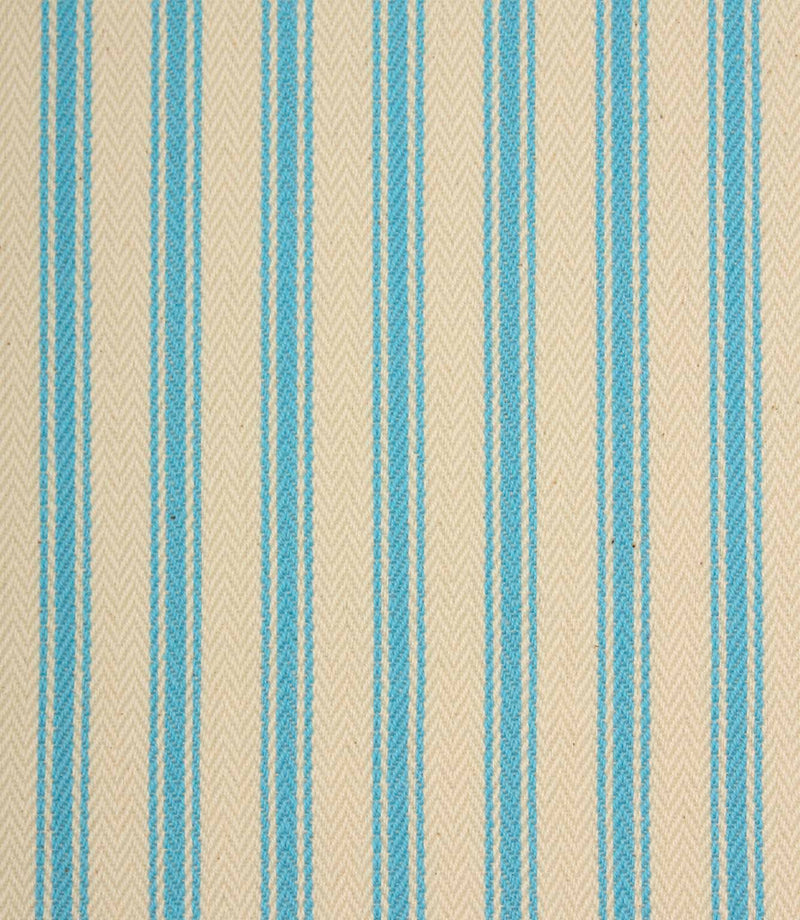 Close-up of ivory herringbone weave fabric featuring fine Pacific blue ticking stripes and textured detailing.