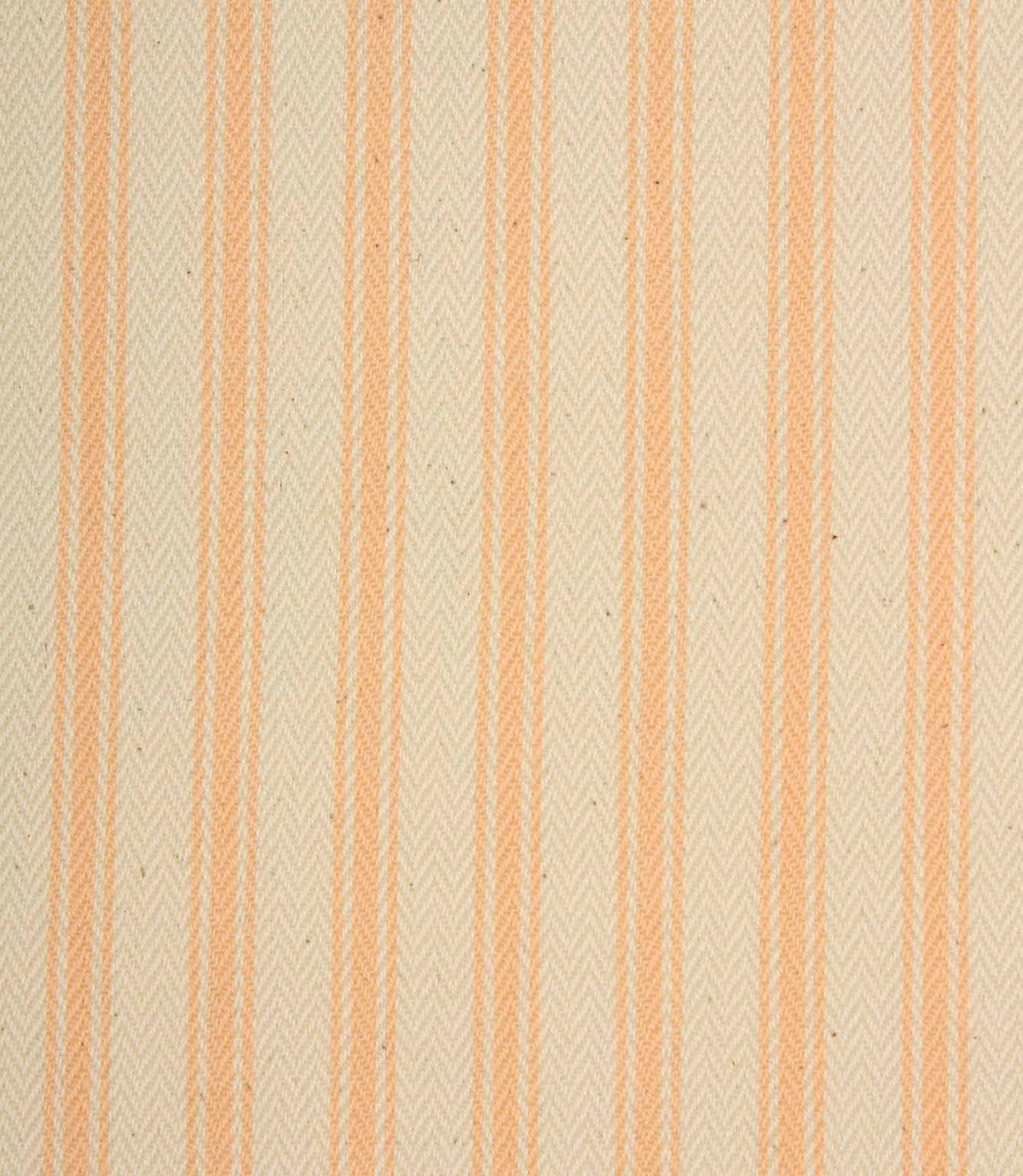 Close-up of ivory herringbone weave fabric featuring delicate peach ticking stripes and subtle textured detailing.