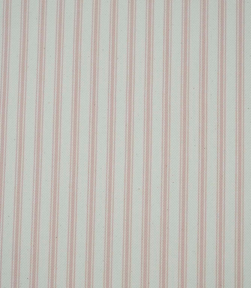 Close-up of pink ticking stripe fabric highlighting the classic striped design and woven herringbone texture.