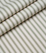 Rolled sap green ticking stripe fabric highlighting the classic striped design and subtle woven herringbone texture.