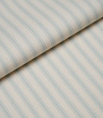Folded Sea Spray ticking stripe fabric highlighting the soft drape, woven texture and classic striped design.
