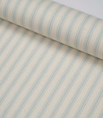 Rolled Sea Spray ticking stripe fabric displaying the classic blue stripe design and premium woven finish.