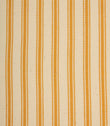 Close-up of ivory herringbone weave fabric featuring fine turmeric yellow ticking stripes and textured detailing.