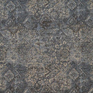 Blue Keshan tapestry upholstery fabric with an intricate distressed Persian-inspired pattern in soft blue, grey and beige tones.
