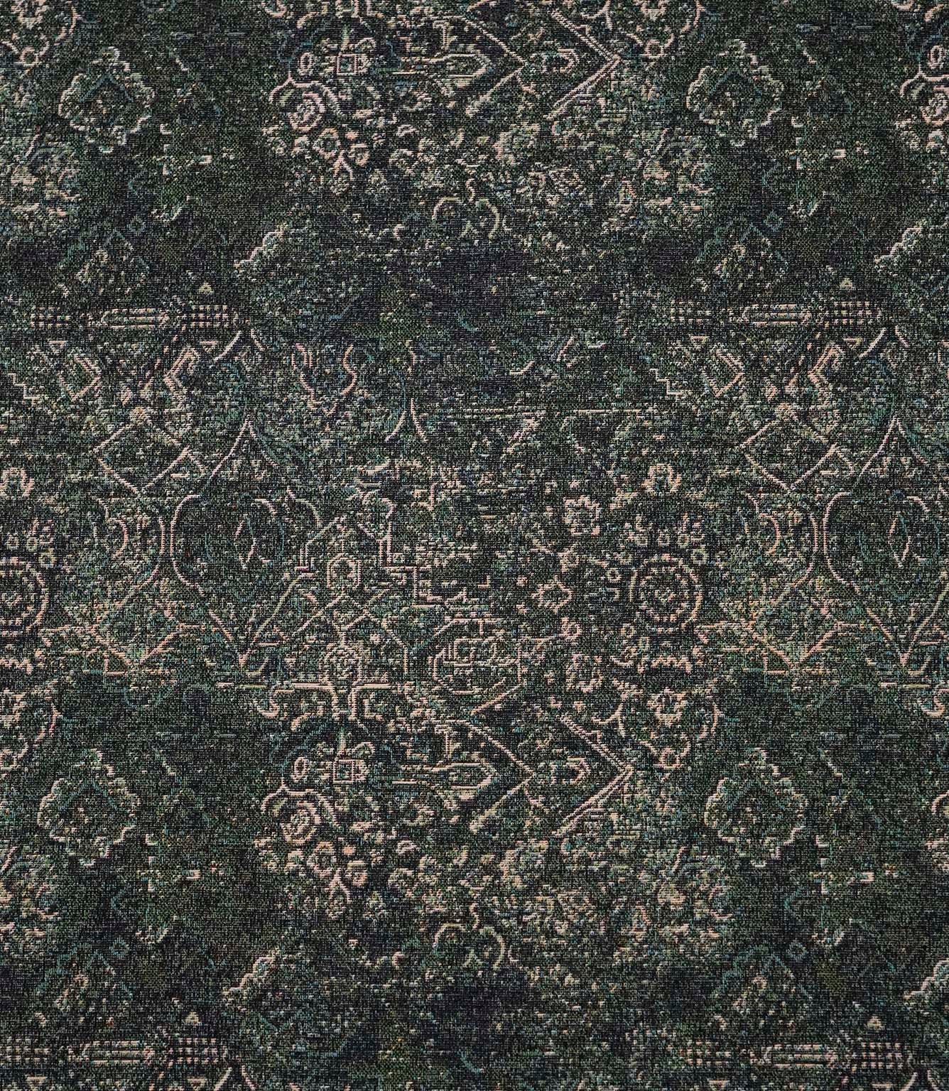 Green Keshan tapestry upholstery fabric with an all-over distressed Persian-style pattern in rich green, black and beige tones.