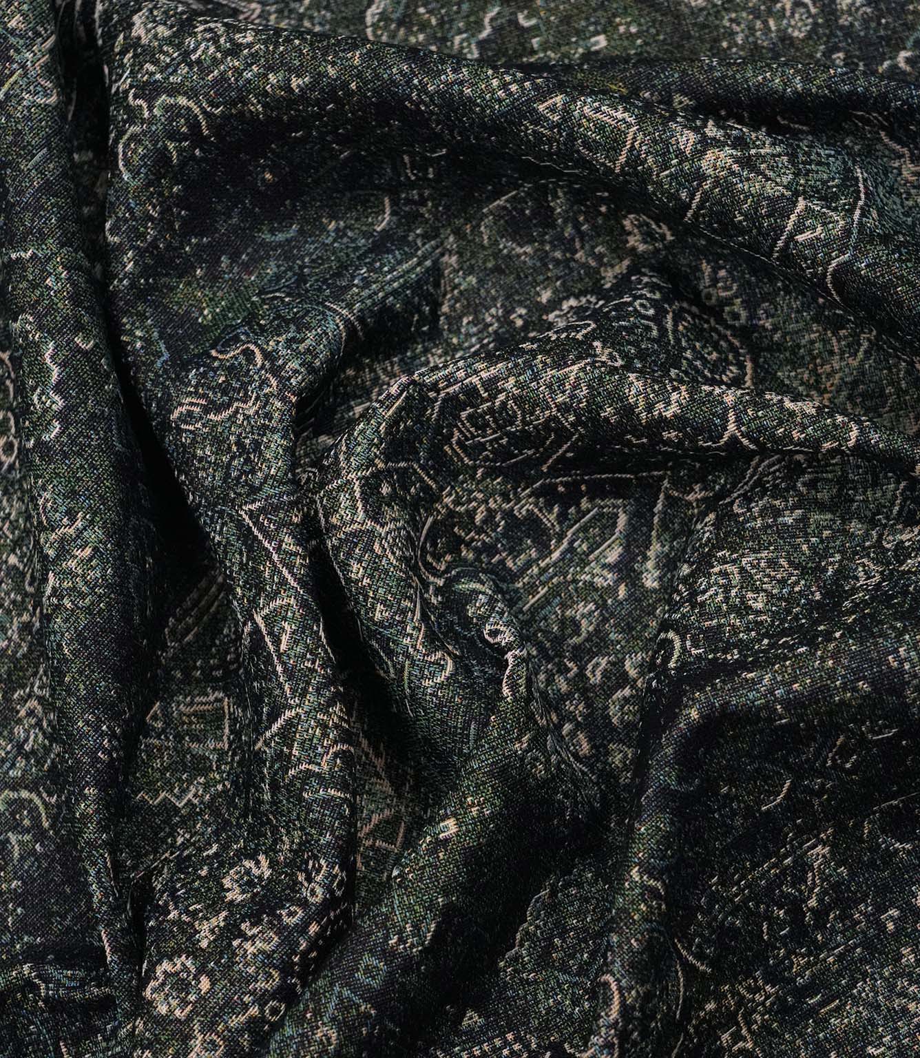 Green Keshan tapestry fabric draped to highlight its soft handle, woven texture and distressed Persian-style pattern.