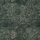 Keshen Tapestry Green fabric featuring an intricate distressed Persian-inspired pattern with ornamental floral motifs in deep forest green, teal, charcoal and muted cream.