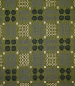 Kinfolk geometric fabric shown flat, with an olive green ground and repeating black, grey and cream woven-style motifs arranged in a structured pattern.
