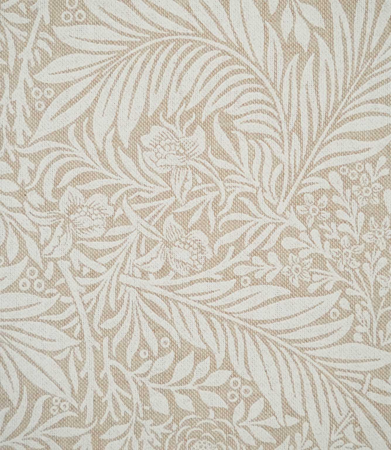 Close-up of Larkspur Linen Look fabric showing its textured weave and detailed cream botanical pattern of leaves, flowers and foliage on soft beige.
