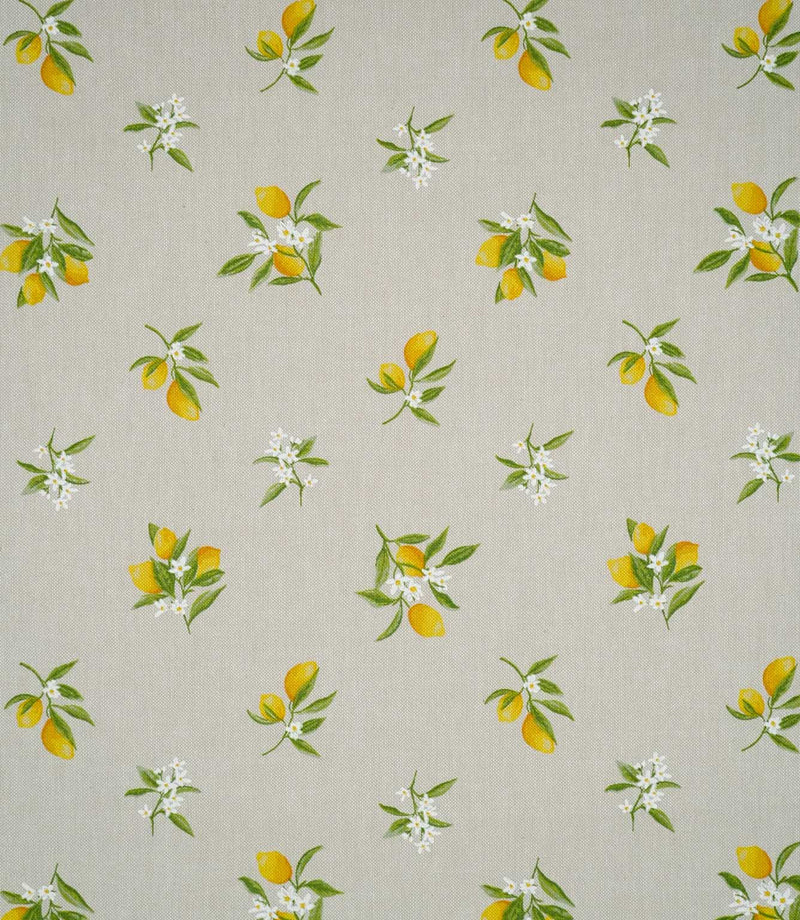Lemon Grove Natural fabric featuring a repeating botanical print of bright yellow lemons, green leaves and delicate white citrus blossoms scattered across a natural beige woven background.