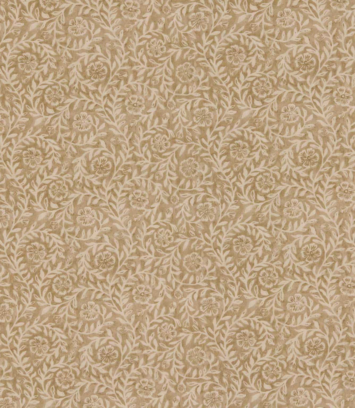 Manorville Dune floral fabric featuring an intricate repeating botanical pattern of delicate cream flowers, intertwining leafy vines and trailing foliage against a warm sandy beige background.