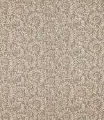 Manorville Quaker floral fabric featuring a repeating botanical pattern of delicate ivory flowers, trailing leafy branches and intertwining stems against a warm taupe and stone background with a subtle woven texture.
