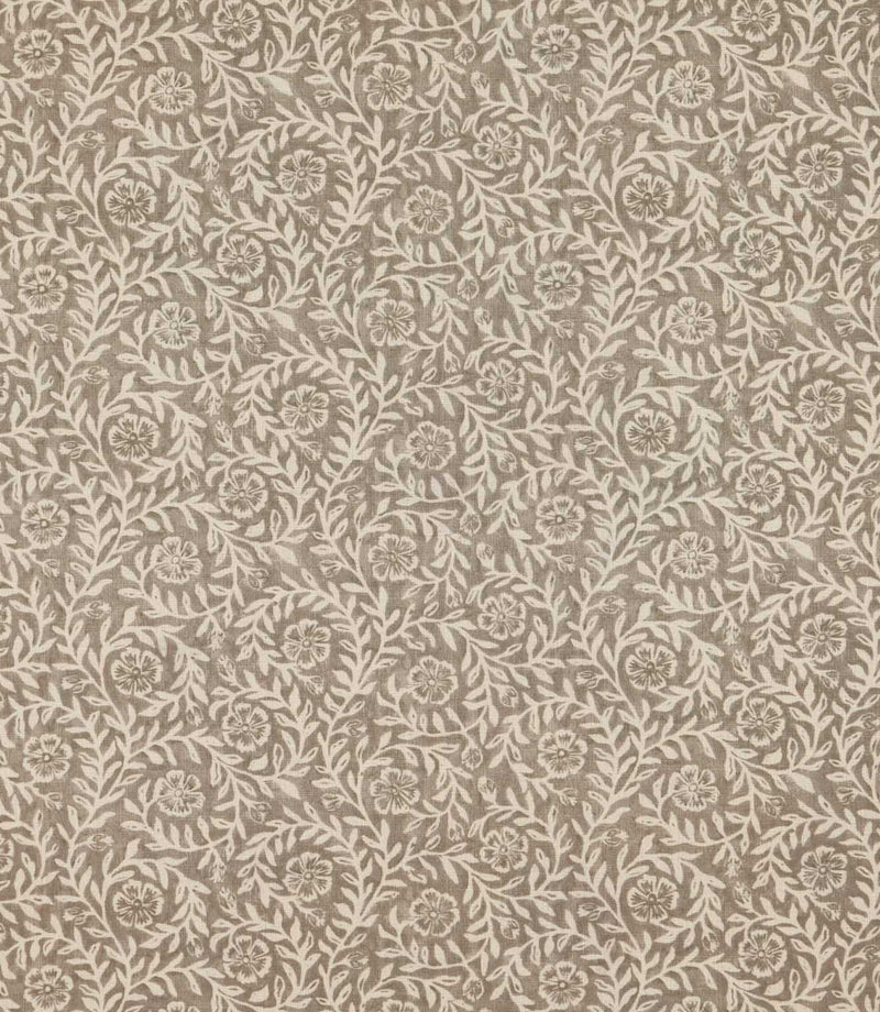 Manorville Quaker floral fabric featuring a repeating botanical pattern of delicate ivory flowers, trailing leafy branches and intertwining stems against a warm taupe and stone background with a subtle woven texture.