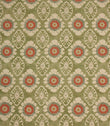 Vintage floral medallion fabric in olive green with coral and cream detailing, shown as a full repeat pattern on textured linen-style cloth.