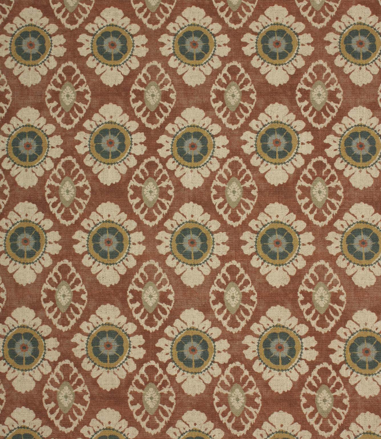 Vintage-inspired floral medallion fabric in terracotta red with cream and deep blue detailing, shown as a full repeat pattern.