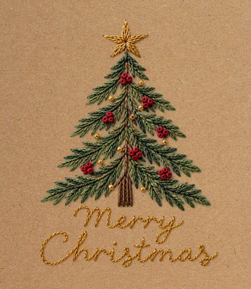 An embroidered Christmas tree on a kraft paper background, decorated with green needles, red berries, gold ornaments, and a gold star, with the words 'Merry Christmas' stitched below in gold.