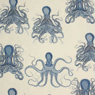 Nautical octopus print fabric in deep blue on an ivory background, shown as a full repeat pattern with detailed illustrated sea creatures.