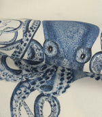 Detailed close-up of octopus printed fabric highlighting intricate tentacle patterns, shading and textured weave finish.