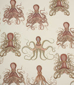 Fabric with orange octopus pattern on a cream background