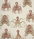 Fabric with orange octopus pattern on a cream background