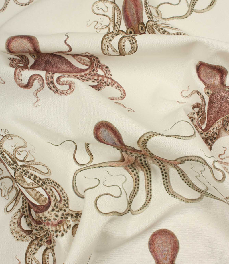Fabric with octopus pattern on a beige background