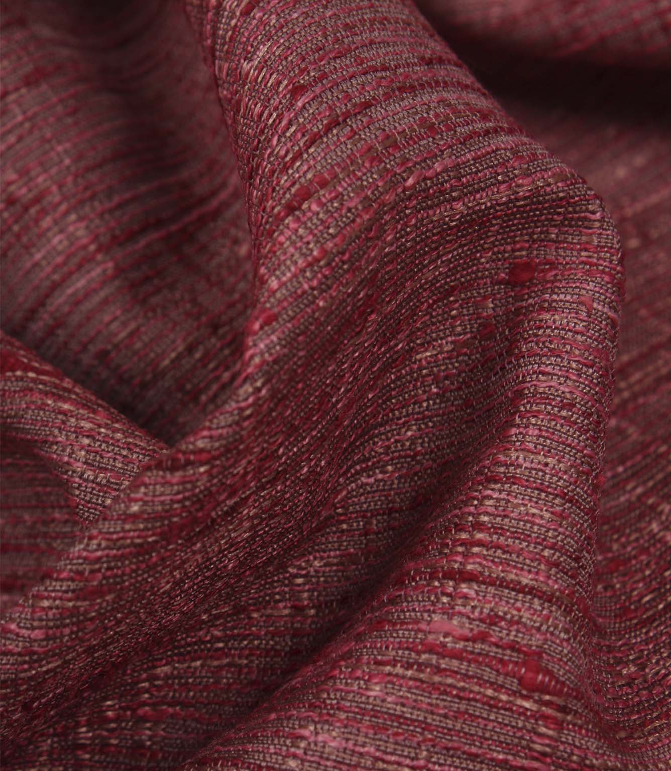 Close-up of Otaru woven fabric in red and pink, highlighting the tactile weave and subtle tonal variation.