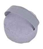 Grey fabric wrist pincushion with an elasticated wrist strap, shown from the back to display the padded circular cushion and wearable band.