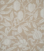 Close-up of Pomegranate Linen Look William Morris fabric in beige and cream, showing pomegranate fruits, leaves, flowers and the textured linen-look weave