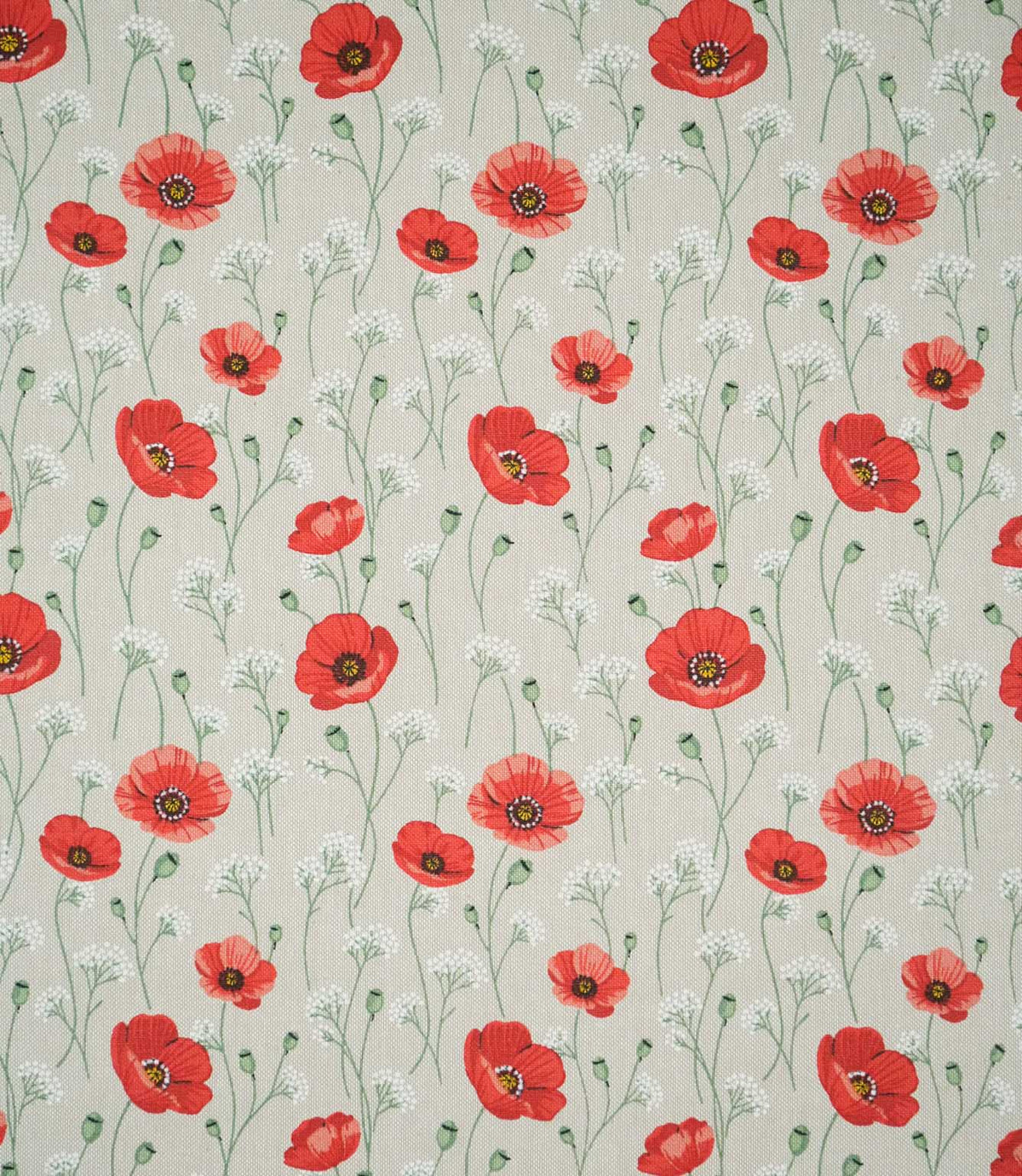 Poppy Trail Red floral fabric featuring a repeating pattern of red and coral poppies, delicate white wildflowers and green stems on a natural beige woven background.