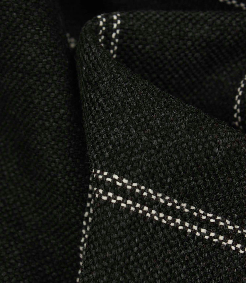 Macro detail of charcoal woven upholstery fabric with subtle white stitched stripe pattern and textured finish.