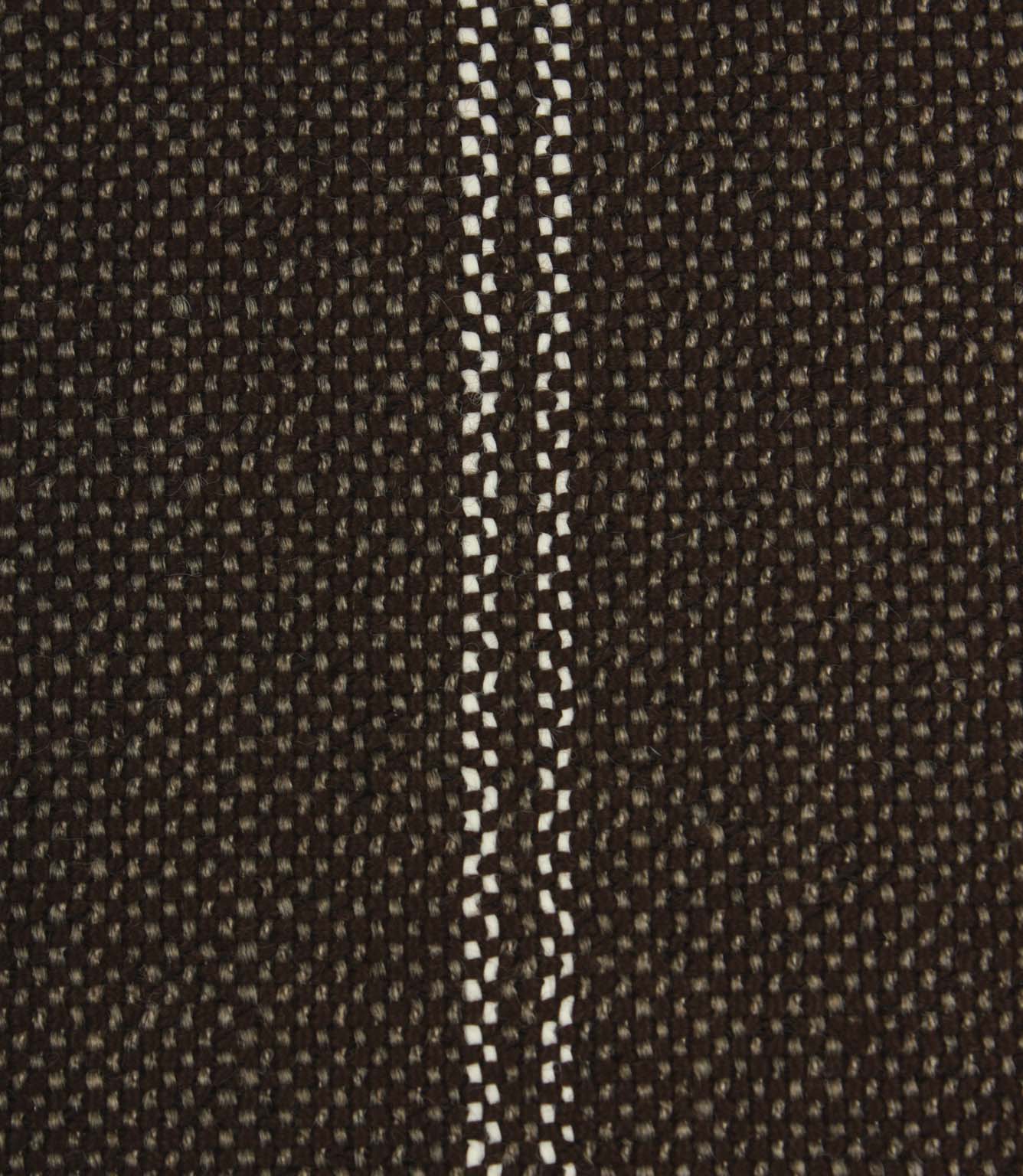 Close-up detail of coffee brown textured fabric featuring narrow white stitched stripe detailing.