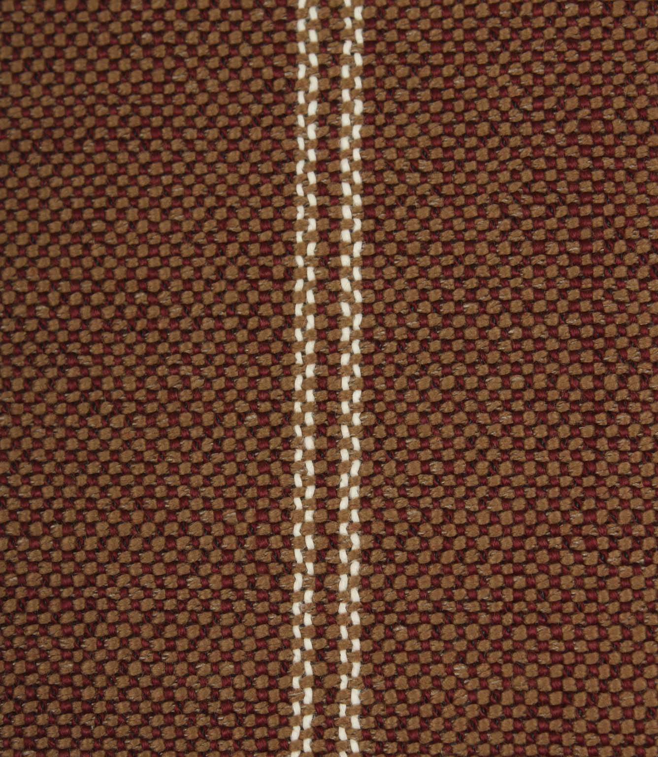 Close-up detail of copper brown textured fabric featuring narrow cream stitched stripe detailing.