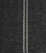 Close-up detail of ink blue textured fabric featuring narrow white stitched stripe detailing.