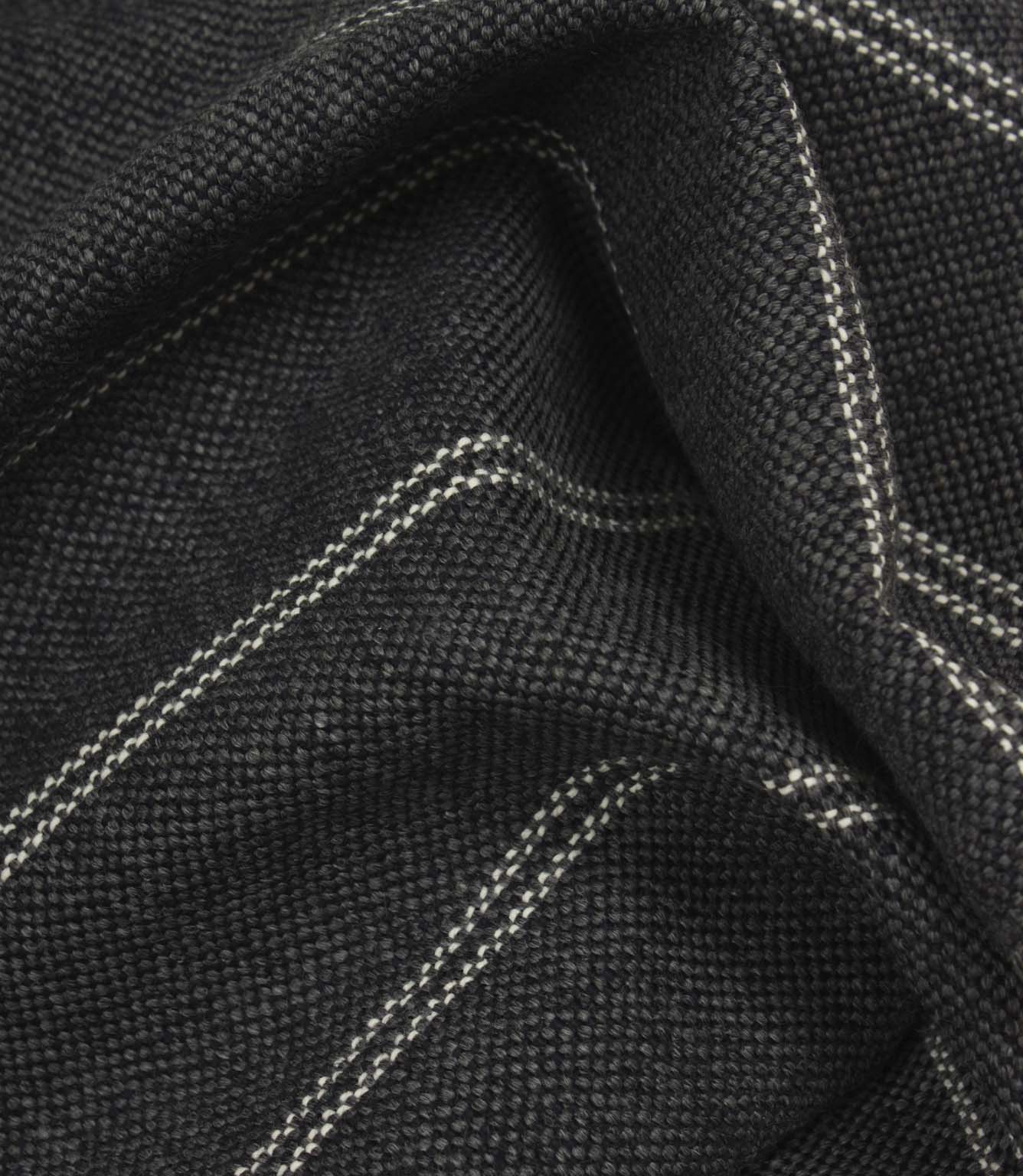 Draped ink blue woven fabric with delicate white stripe pattern and soft structured folds.