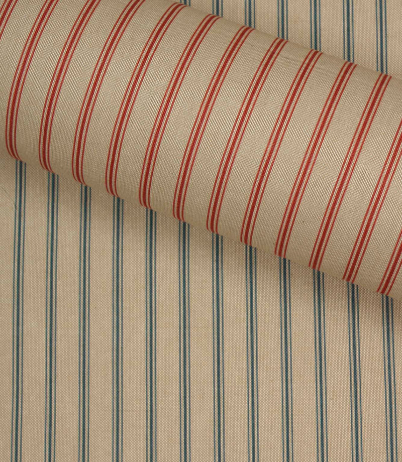 Red striped woven fabric layered over blue stripe fabric, showing contrasting ticking stripe colour options.