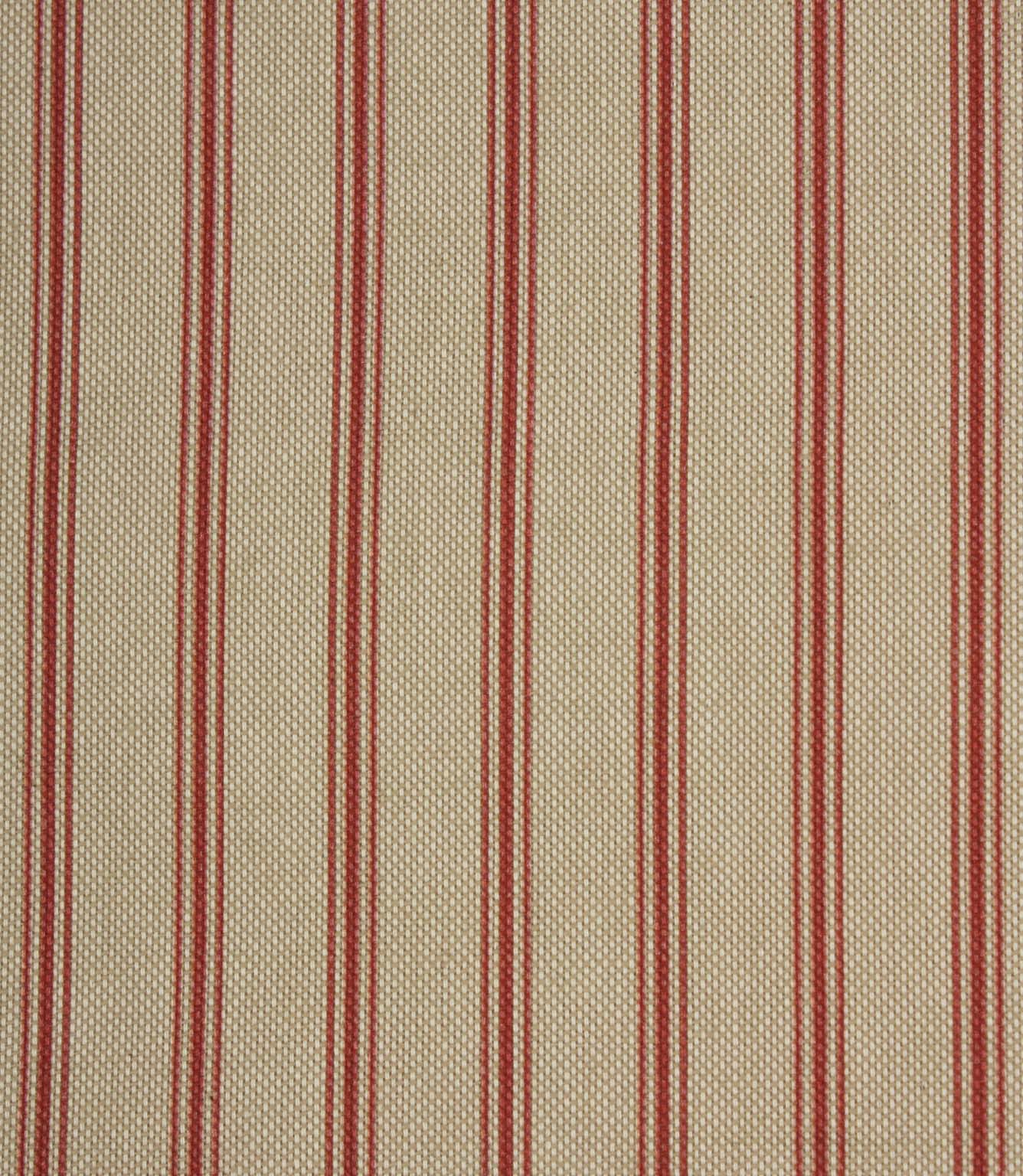 Close-up of red striped fabric with textured beige weave and evenly spaced fine vertical stripes.