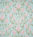 Rithani Robin's Egg fabric featuring a repeating botanical print of pink and cream pomegranates, delicate sage green foliage and slender stems on a soft duck egg blue background.