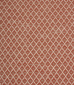 Rust red and cream woven fabric featuring a small-scale geometric pattern with soft taupe accents in a repeating lattice design.