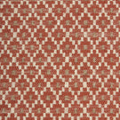 Close-up of textured upholstery fabric showcasing the intricate rust red geometric weave with cream detailing and subtle taupe highlights.