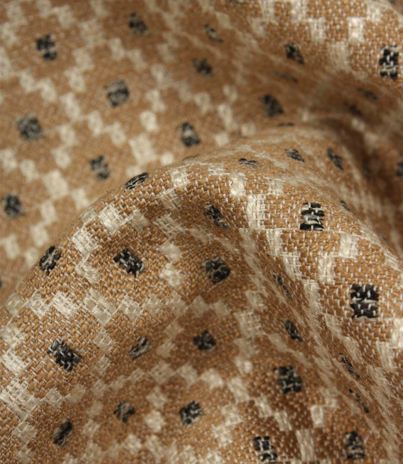 Detailed close-up of Rossini Mocha fabric emphasising the rich woven texture and geometric pattern.