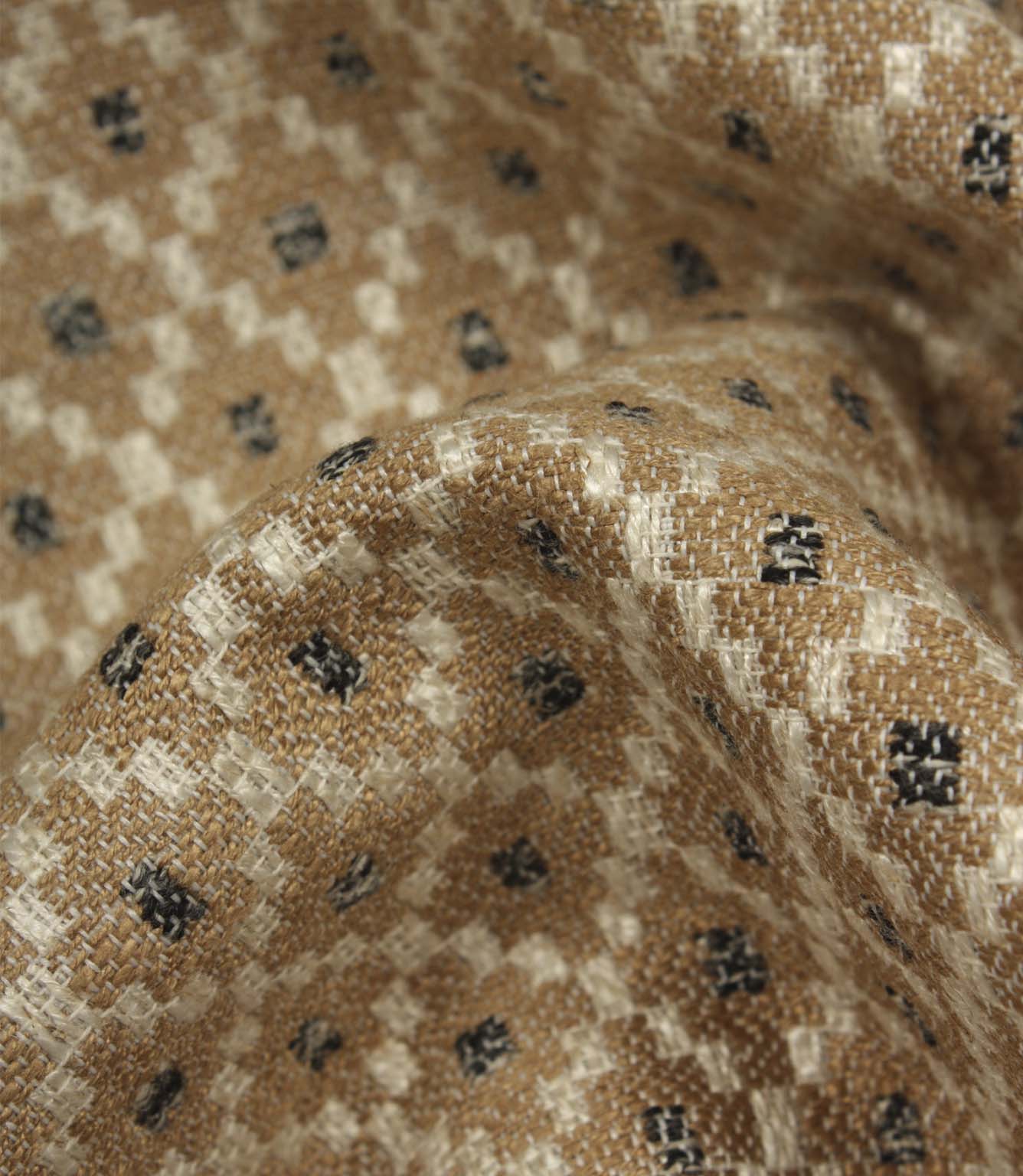 Detailed close-up of Rossini Mocha fabric emphasising the rich woven texture and geometric pattern.