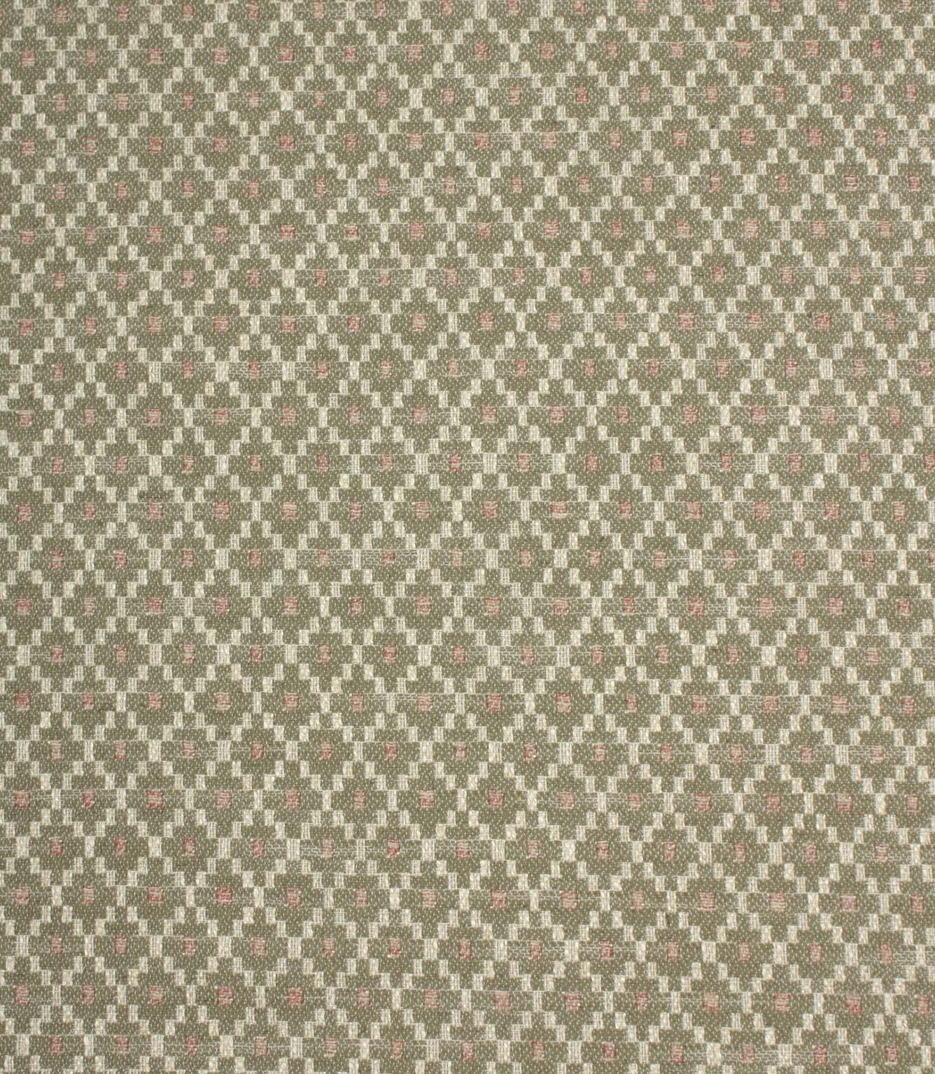 Sage green and cream woven fabric featuring a small-scale geometric pattern with soft blush pink accents in a repeating lattice design.