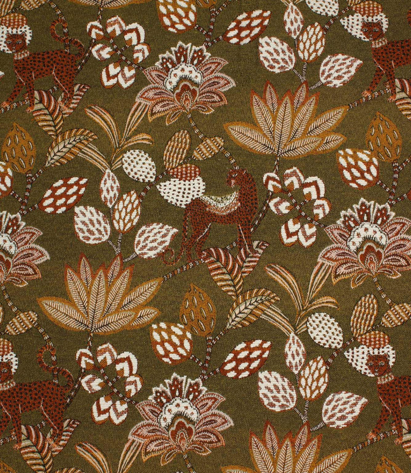 Olive green jacquard fabric featuring stylised leopards, tropical leaves and floral motifs in rust, cream and ochre tones.