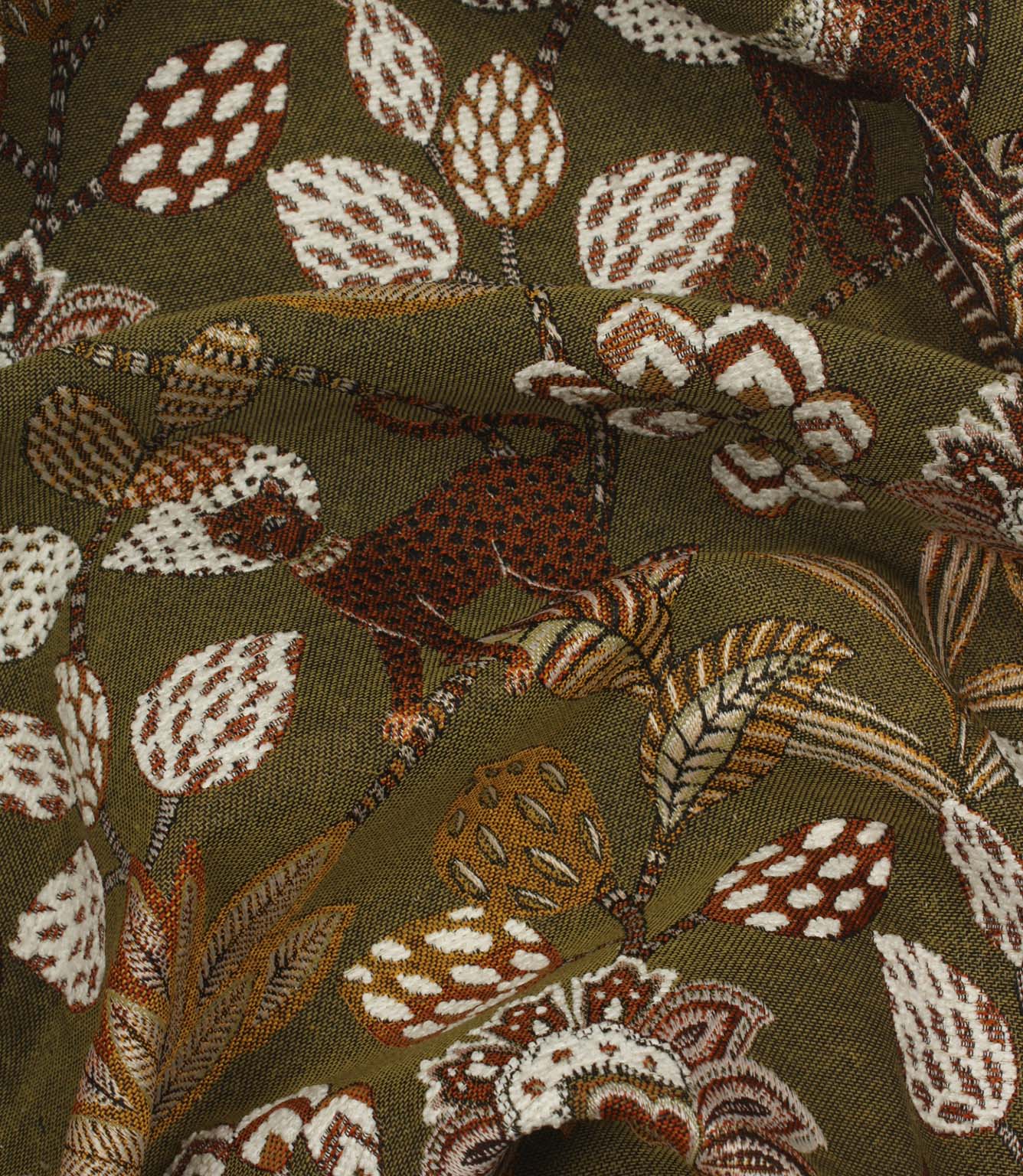 Draped olive green jacquard fabric with stylised jungle-inspired leopard and botanical design.