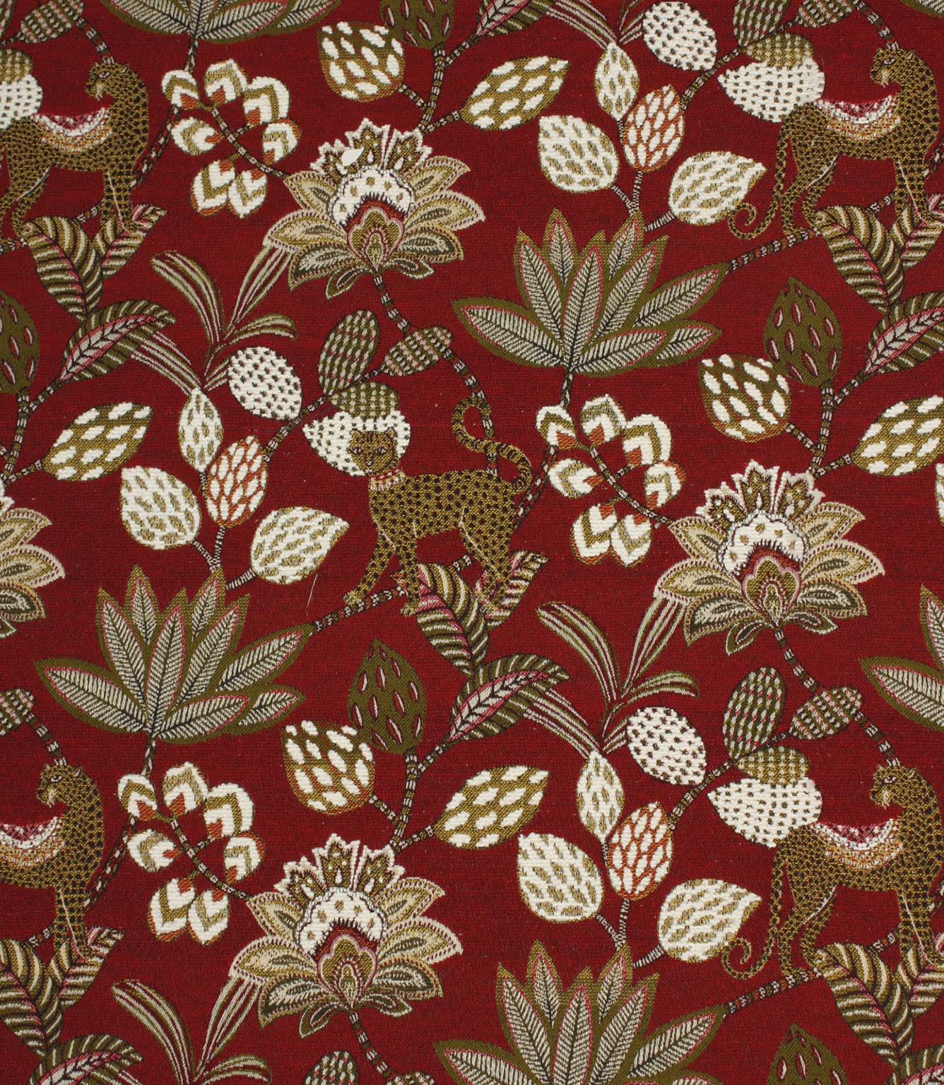 Red jacquard fabric with stylised leopard and floral pattern in cream, olive and gold tones.