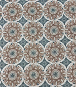 Full repeat view of Sand Rosette outdoor upholstery fabric with decorative botanical medallions in beige, duck egg blue, cream, and soft grey tones.