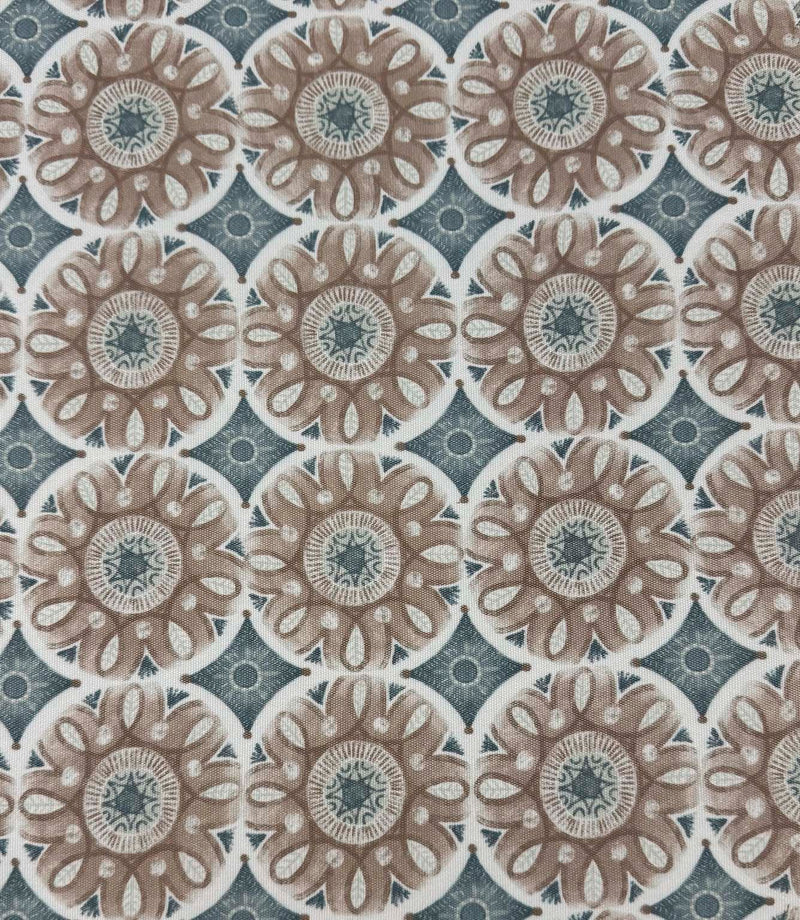 Full repeat view of Sand Rosette outdoor upholstery fabric with decorative botanical medallions in beige, duck egg blue, cream, and soft grey tones.