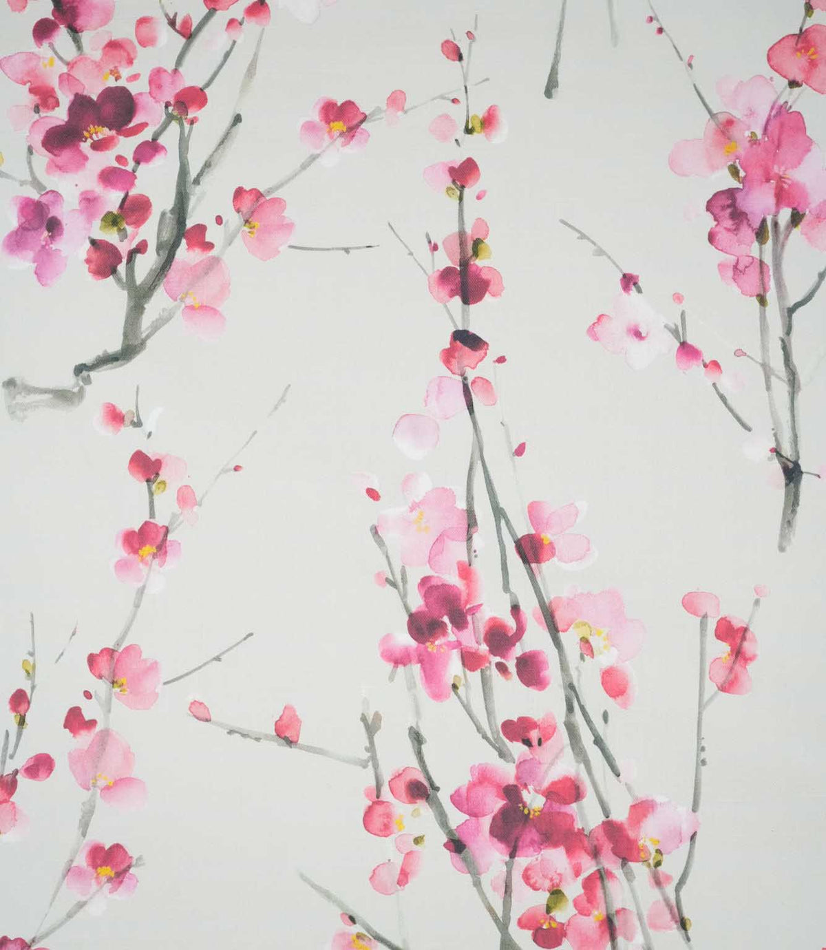 Seville Blossom Stone fabric featuring a delicate watercolour floral print of pink, blush and deep raspberry blossoms on slender grey-green branches against a soft stone background.